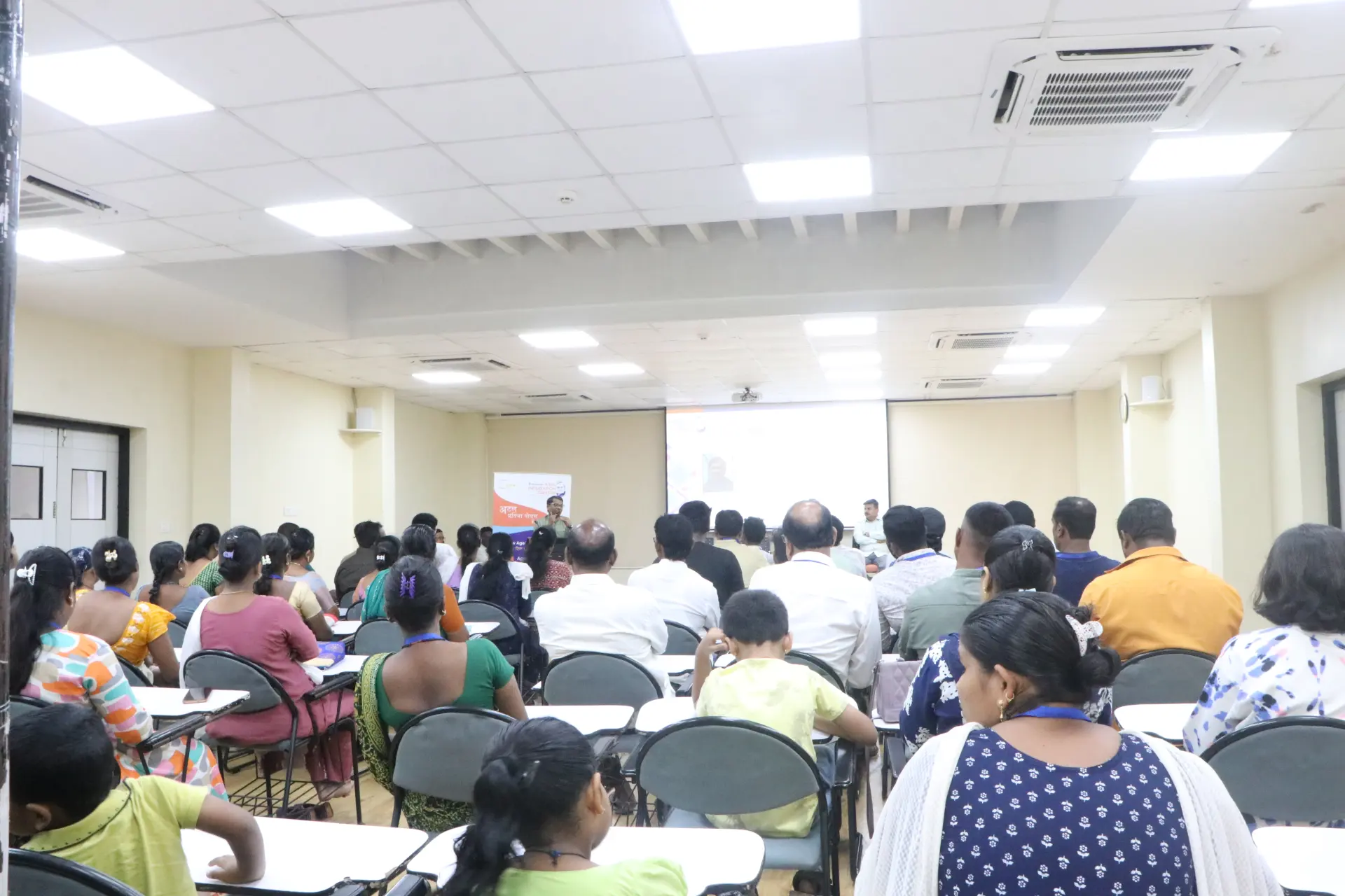 Community Awareness Session — Citizens participating in guided discussion